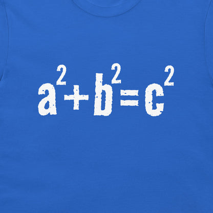 A close-up of a royal blue t-shirt featuring the mathematical equation 'a^2 + b^2 = c^2' printed in a distressed white font across the chest.
