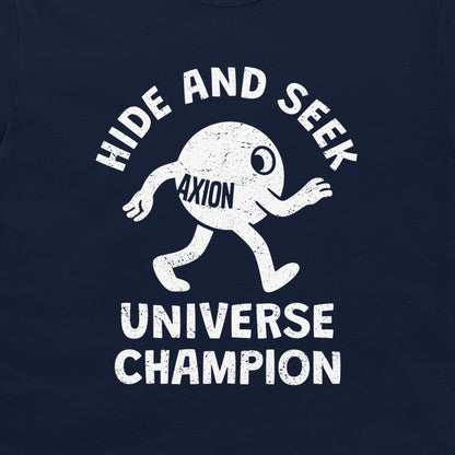 A close-up of a navy blue t-shirt featuring a distressed white graphic of a cartoon character with the text 'HIDE AND SEEK' above and 'UNIVERSE CHAMPION' below, with 'AXION' printed on the character's torso.