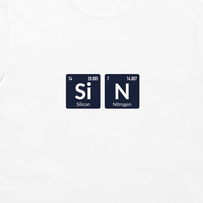A close-up of a white t-shirt featuring a graphic print of two white periodic table tiles spelling out 'SiN' with 'Silicon' and 'Nitrogen' written underneath.