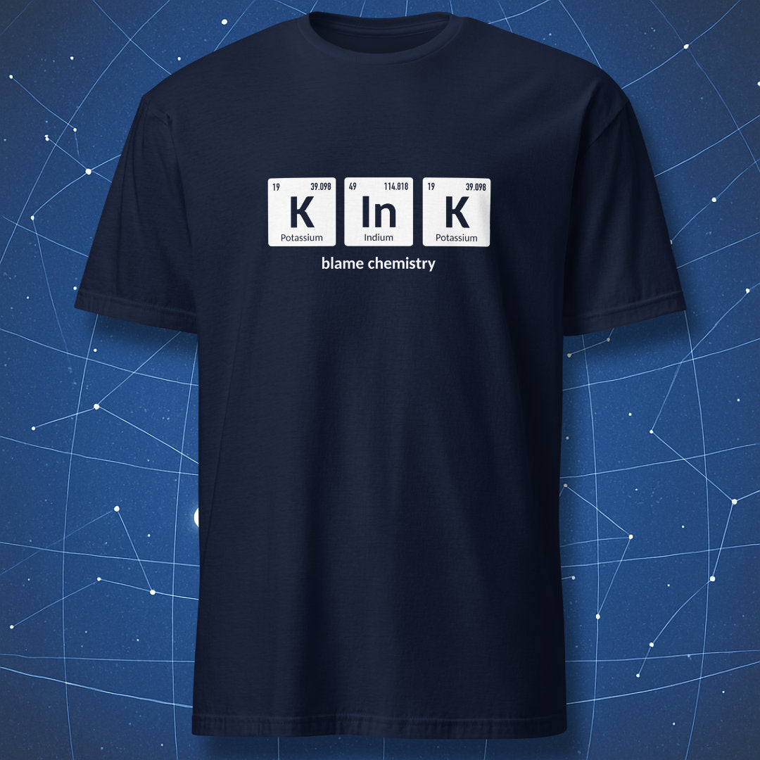 Navy blue T-shirt with K–In–K periodic table chemistry joke using Potassium, Indium, and Potassium elements and ‘blame chemistry’ text.