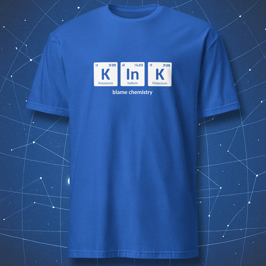 Royal blue T-shirt displaying K–In–K periodic table pun with Potassium, Indium, Potassium element tiles and the phrase ‘blame chemistry’.