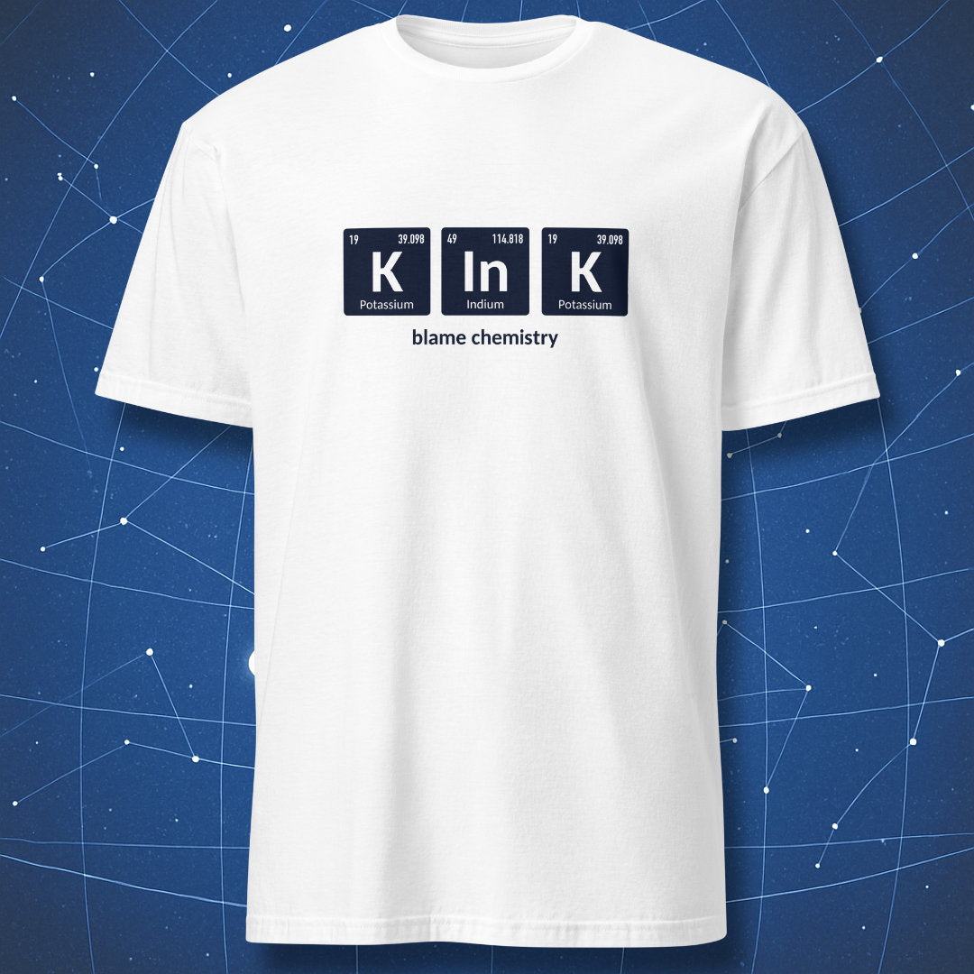 White T-shirt showcasing K–In–K periodic table design with Potassium, Indium, and Potassium elements and humorous ‘blame chemistry’ caption.