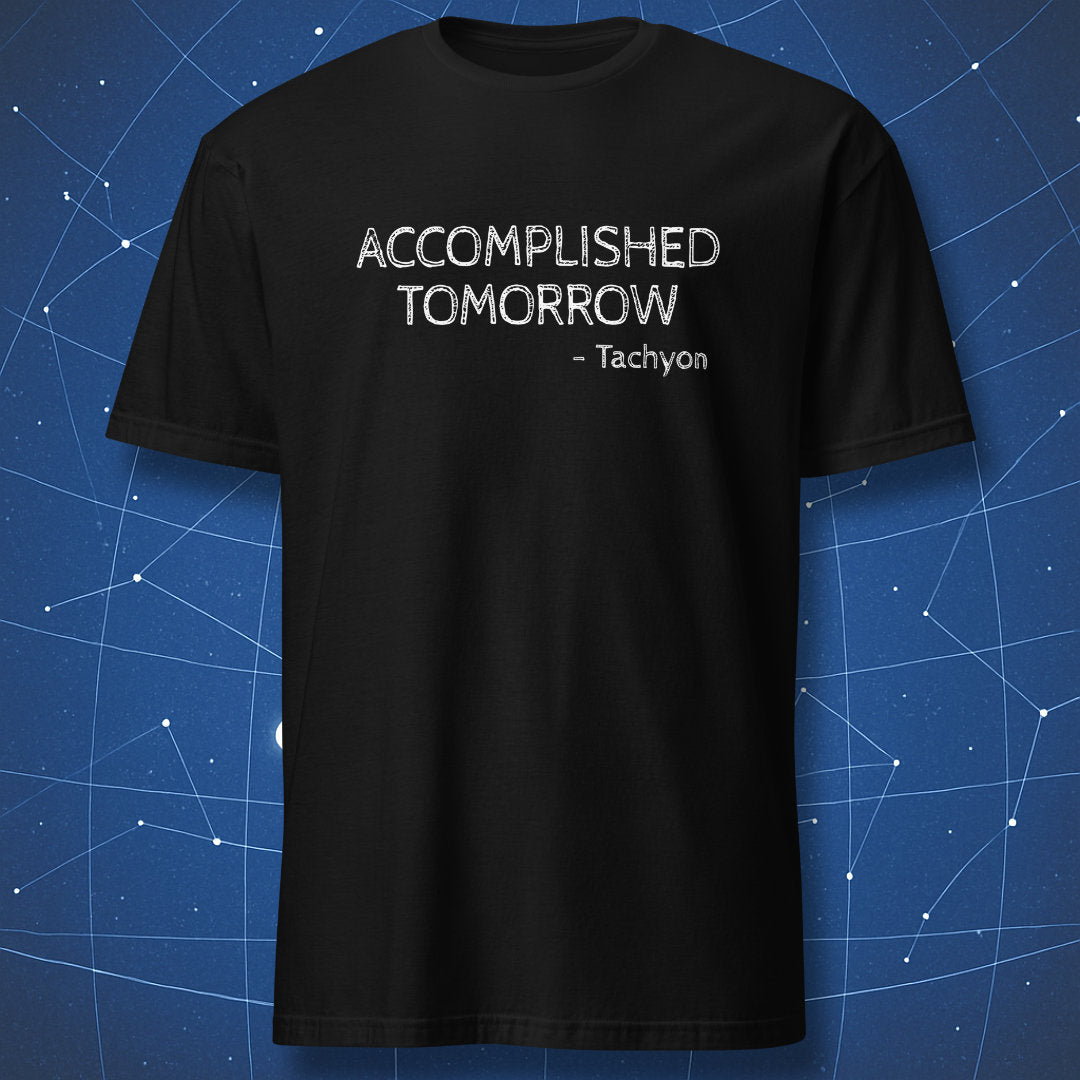 Black T‑shirt with white chalkboard lettering reading “Accomplished Tomorrow – Tachyon” in a playful physics pun design.