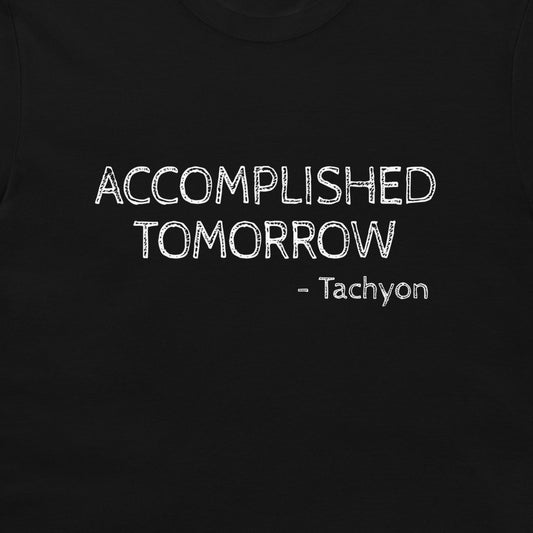 A close-up of a black t-shirt featuring the text 'ACCOMPLISHED TOMORROW - Tachyon' printed in a white, chalk-like distressed font.