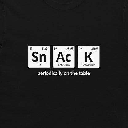 A black crewneck t-shirt featuring a white periodic table graphic that spells out 'SnAcK' with the phrase 'periodically on the table' underneath.