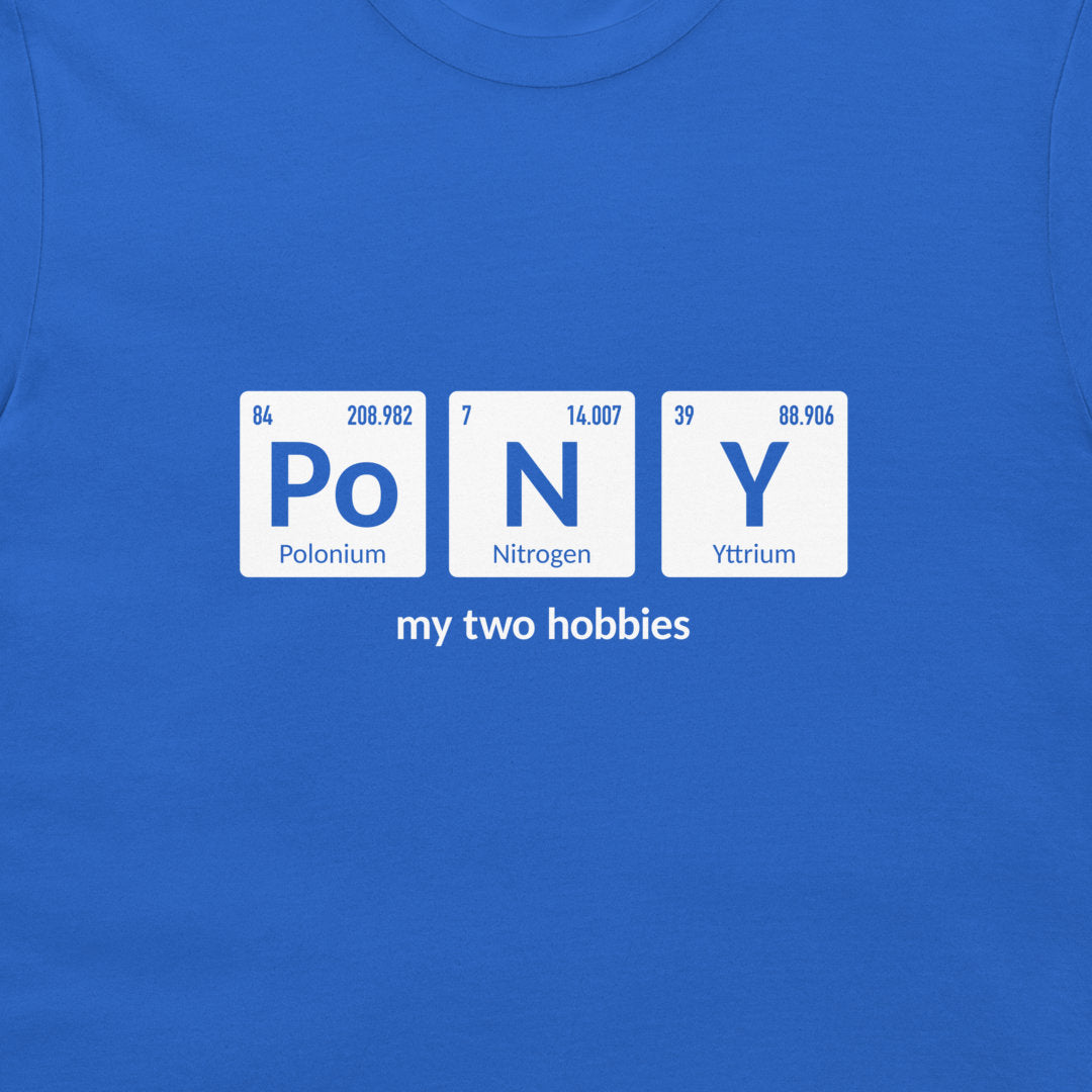 A close-up of a royal blue t-shirt featuring a graphic design that spells 'PoNY' using periodic table style tiles for 'Po', 'N', and 'Y', with the text 'my two hobbies' printed below in white.