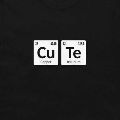 A close-up of a black t-shirt, featuring a white graphic print of two periodic table style tiles spelling out 'CuTe' with 'Copper' and 'Tellurium' written underneath.