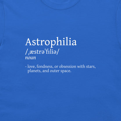 A close-up of a blue T-shirt with white printed text defining the word 'Astrophilia' and its pronunciation.