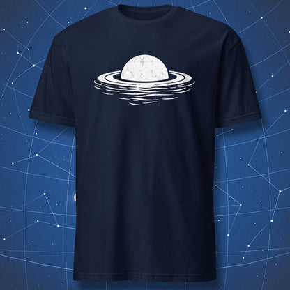 White Saturn planet floating illustration on navy blue t-shirt
