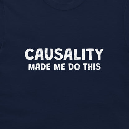 A close-up of a navy blue t-shirt featuring the text 'CAUSALITY MADE ME DO THIS' printed in a distressed white sans-serif font across the chest.