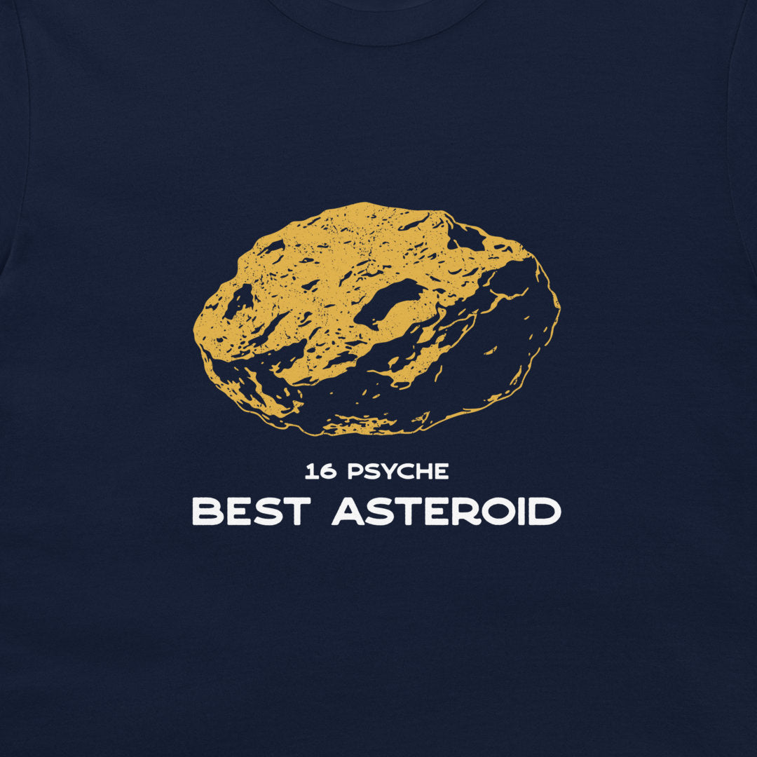 A close-up of a navy blue t-shirt featuring a graphic of a gold asteroid with the text '16 PSYCHE BEST ASTEROID' printed below it.