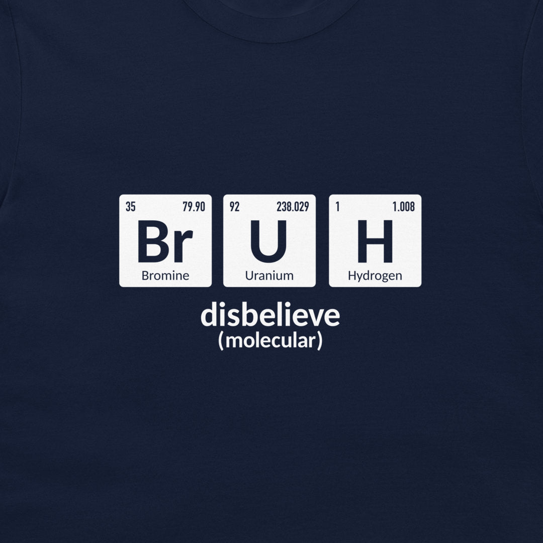 A close-up of a navy blue t-shirt featuring a white graphic that spells out 'disbelieve' using periodic table elements: Bromine, Uranium, and Hydrogen.