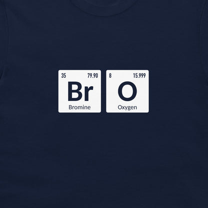 A close-up of a navy blue t-shirt, featuring a graphic print of two white periodic table tiles spelling out 'Bromine' and 'Oxygen'.