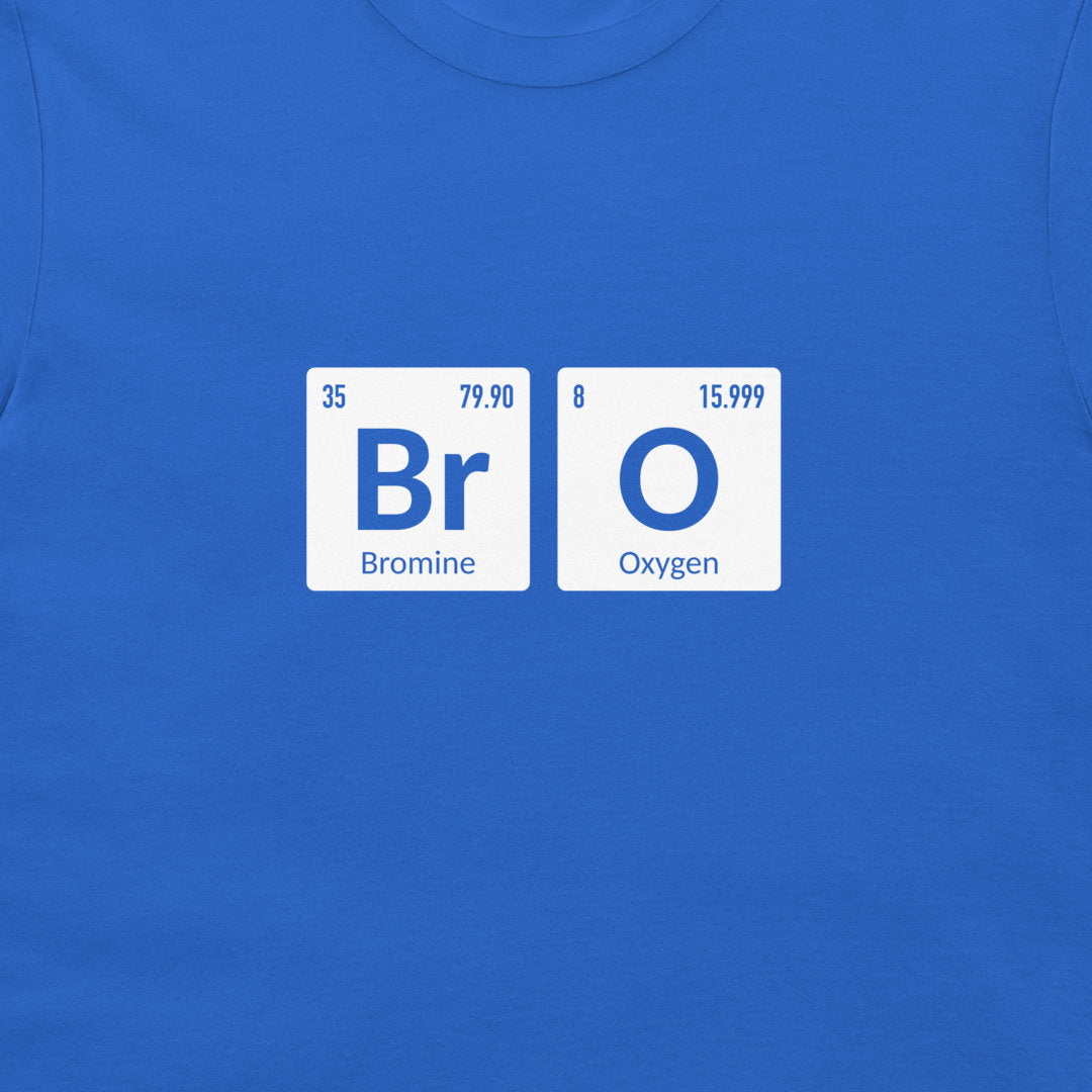 A close-up of a royal blue t-shirt featuring a graphic print of two white periodic table tiles spelling out 'Bromine' and 'Oxygen' to form the word 'BRO'.