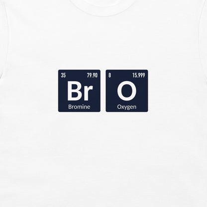 A close-up of a white t-shirt, featuring a graphic print of two navy blue periodic table tiles spelling out 'Bromine' and 'Oxygen'.