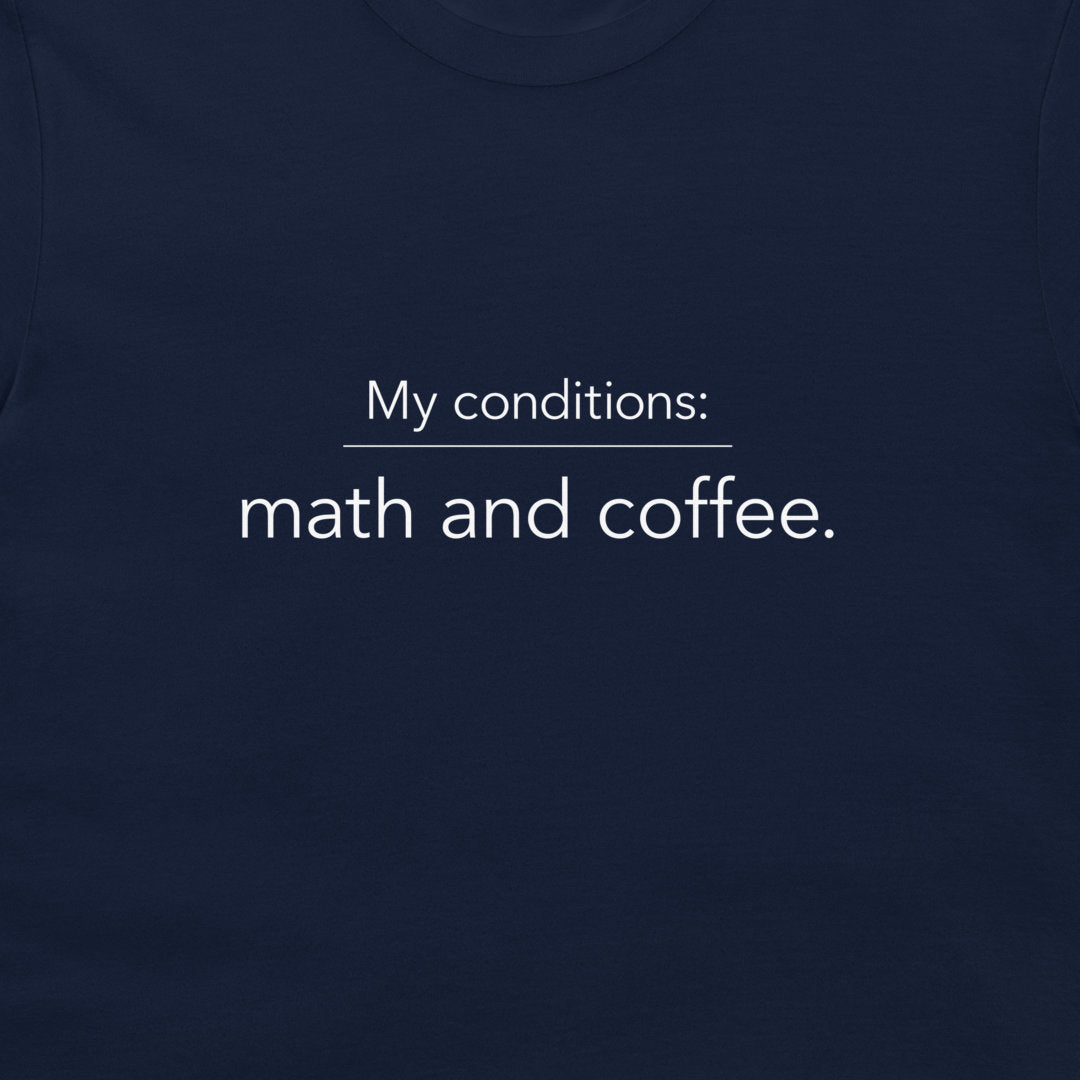 A close-up of a navy blue t-shirt with white printed text that reads 'My conditions: math and coffee.'