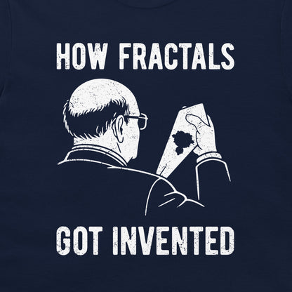 A dark navy blue graphic print on a t-shirt featuring a white distressed illustration of a man holding his stained tie, with the text 'HOW FRACTALS GOT INVENTED' in a bold, weathered font.