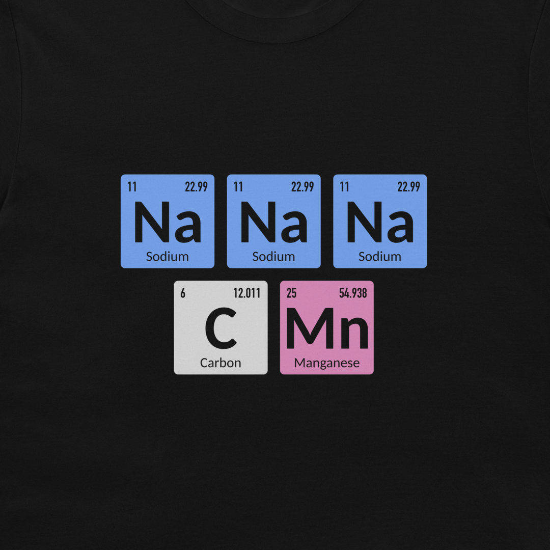 A black crewneck t-shirt featuring a graphic of five periodic table style element tiles spelling out 'NaNaNaC Mn' with 'Sodium', 'Carbon', and 'Manganese' written below each tile.
