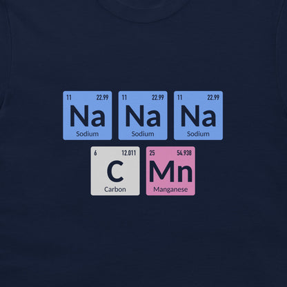 A dark navy blue t-shirt featuring a graphic print of periodic table elements spelling out 'Na Na Na C Mn' in light blue, white, and pink tiles.