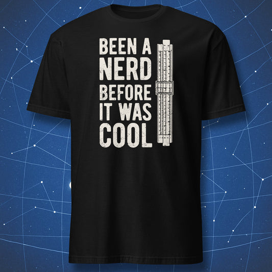 Black T-shirt with “Been a Nerd Before It Was Cool” text and vintage slide rule