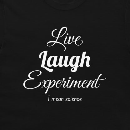 A close-up of a black t-shirt featuring a white printed graphic that reads 'Live Laugh Experiment I mean science' in stylized fonts.
