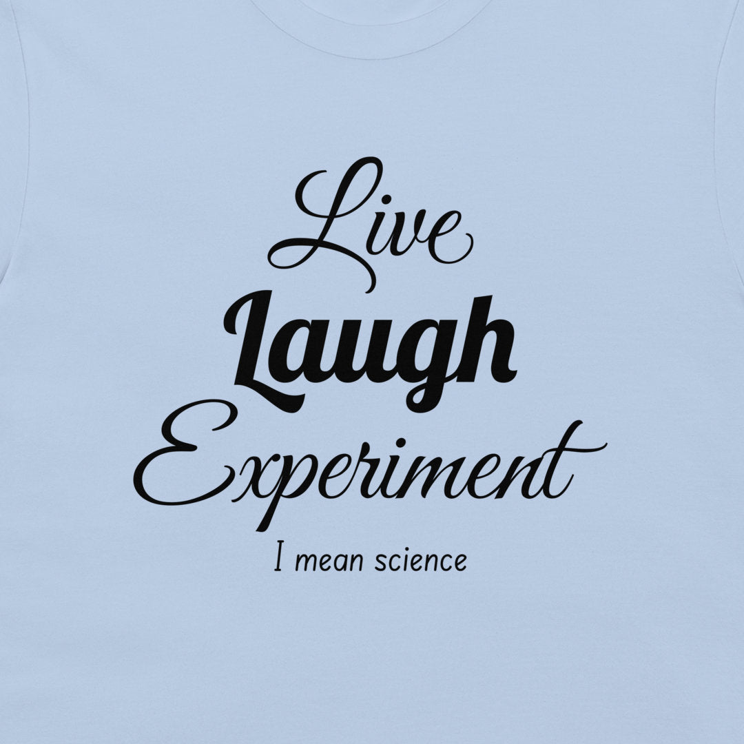 A close-up of a light blue t-shirt featuring the printed text 'Live Laugh Experiment I mean science' in black lettering.