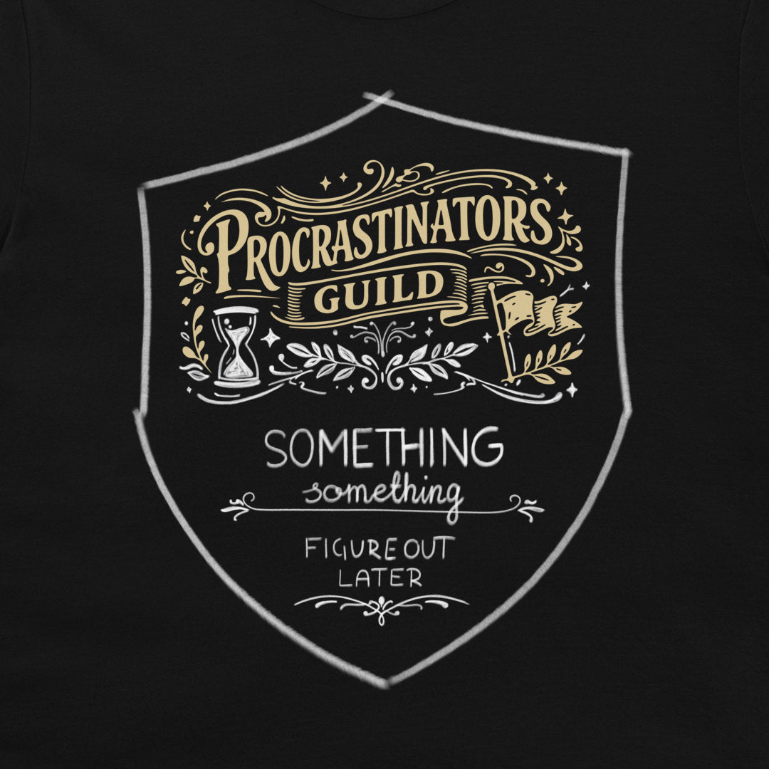 A close-up of a black t-shirt featuring a white and gold graphic print of a shield with the text 'PROCRASTINATORS GUILD' and 'SOMETHING FIGURE OUT LATER'.