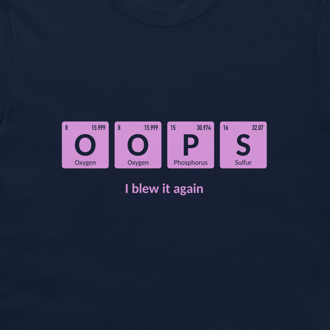 A dark navy blue t-shirt featuring a graphic of four pink periodic table style tiles spelling 'OOPS' with 'I blew it again' printed in white text underneath.