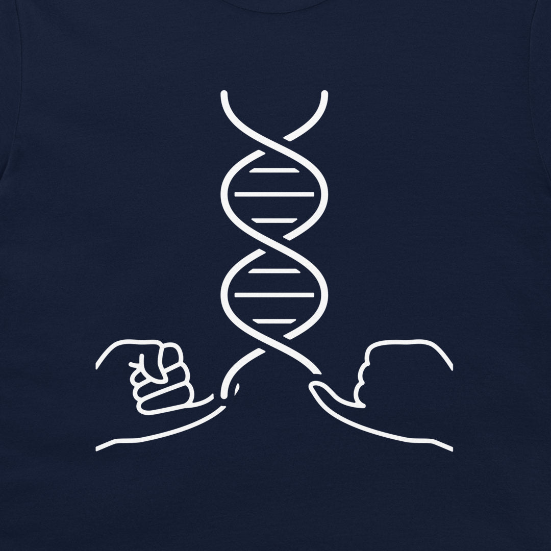A close-up of a dark navy blue t-shirt, featuring a white minimalist line art graphic of a DNA double helix with two hands reaching toward it.