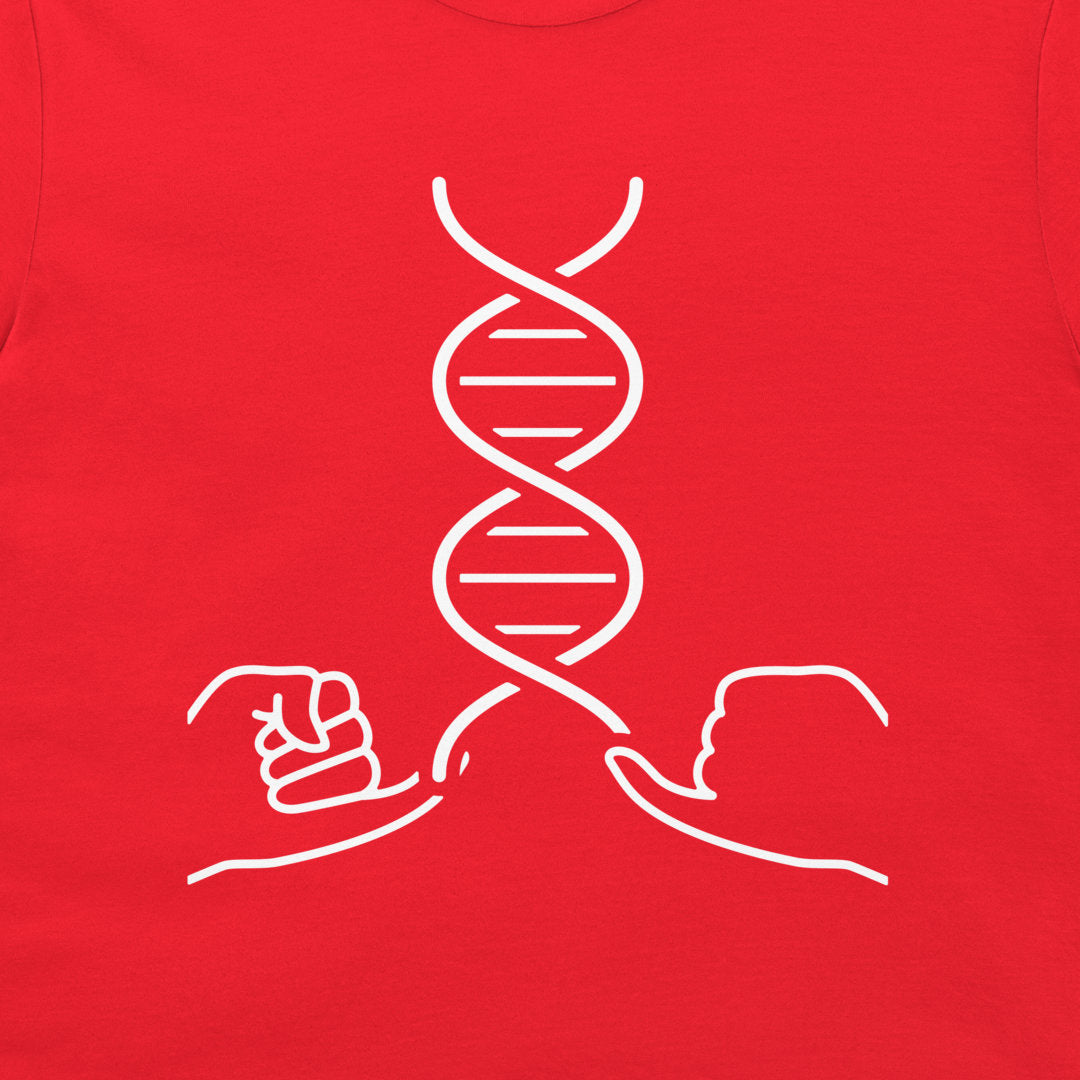 A close-up of a bright red t-shirt, featuring a white graphic print of a DNA double helix with two hands breaking or holding it.