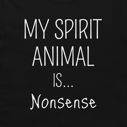 A close-up of a black garment, likely a t-shirt, featuring the phrase 'MY SPIRIT ANIMAL IS.