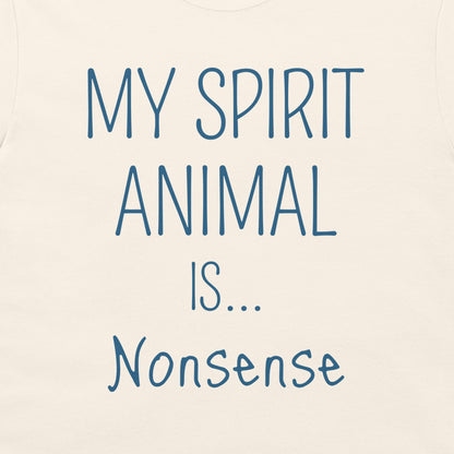 A close-up of a cream-colored t-shirt featuring the text 'MY SPIRIT ANIMAL IS.