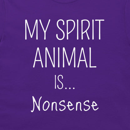 A close-up of a purple garment, likely a t-shirt, featuring the text 'MY SPIRIT ANIMAL IS.