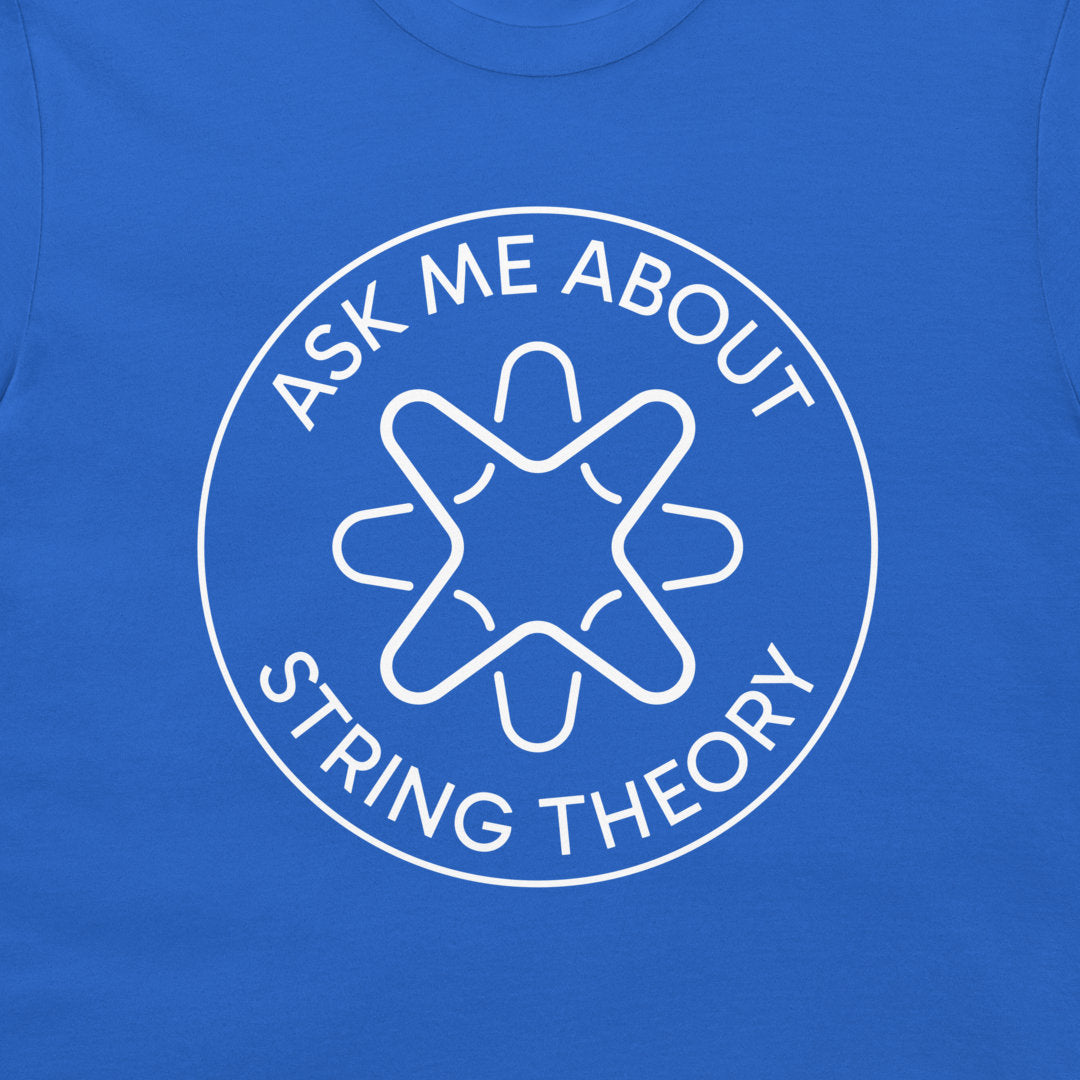 A close-up of a royal blue t-shirt featuring a white circular graphic with the text 'ASK ME ABOUT STRING THEORY' and a stylized graphic.