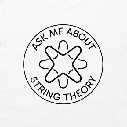 A close-up of a white t-shirt, featuring a black circular graphic with a stylized stringed shape in the center and the text 'ASK ME ABOUT STRING THEORY' printed in a circular border.