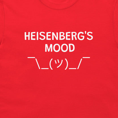 A close-up of a Heisenberg’s Mood quantum physics joke t-shirt on red shirt