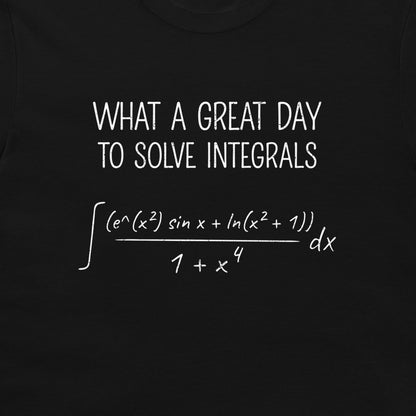 A close-up of a black t-shirt, featuring a white printed graphic that reads 'WHAT A GREAT DAY TO SOLVE INTEGRALS' above a complex mathematical integral formula.