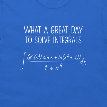 A close-up of a blue T-shirt with white printed text and a mathematical integral equation reading, 'WHAT A GREAT DAY TO SOLVE INTEGRALS.'.