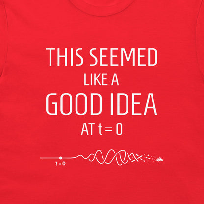 A close-up of a bright red t-shirt featuring a white graphic print that reads 'THIS SEEMED LIKE A GOOD IDEA AT t=0' above a white signal wave diagram starting at t=0.