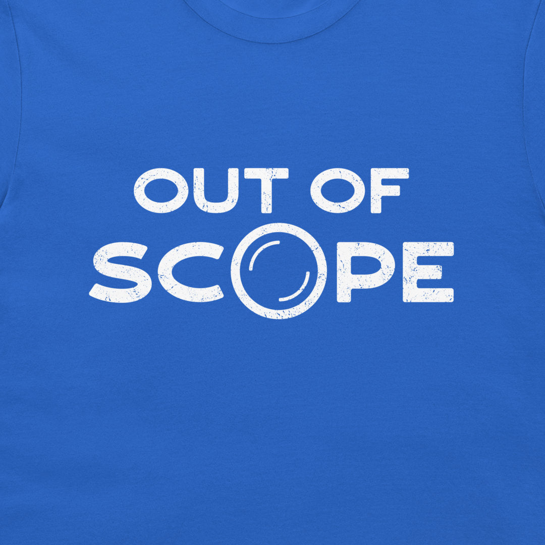A close-up of a royal blue t-shirt featuring a distressed white graphic print that reads 'OUT OF SCOPE' with the letter 'O' stylized as a telescope scope.
