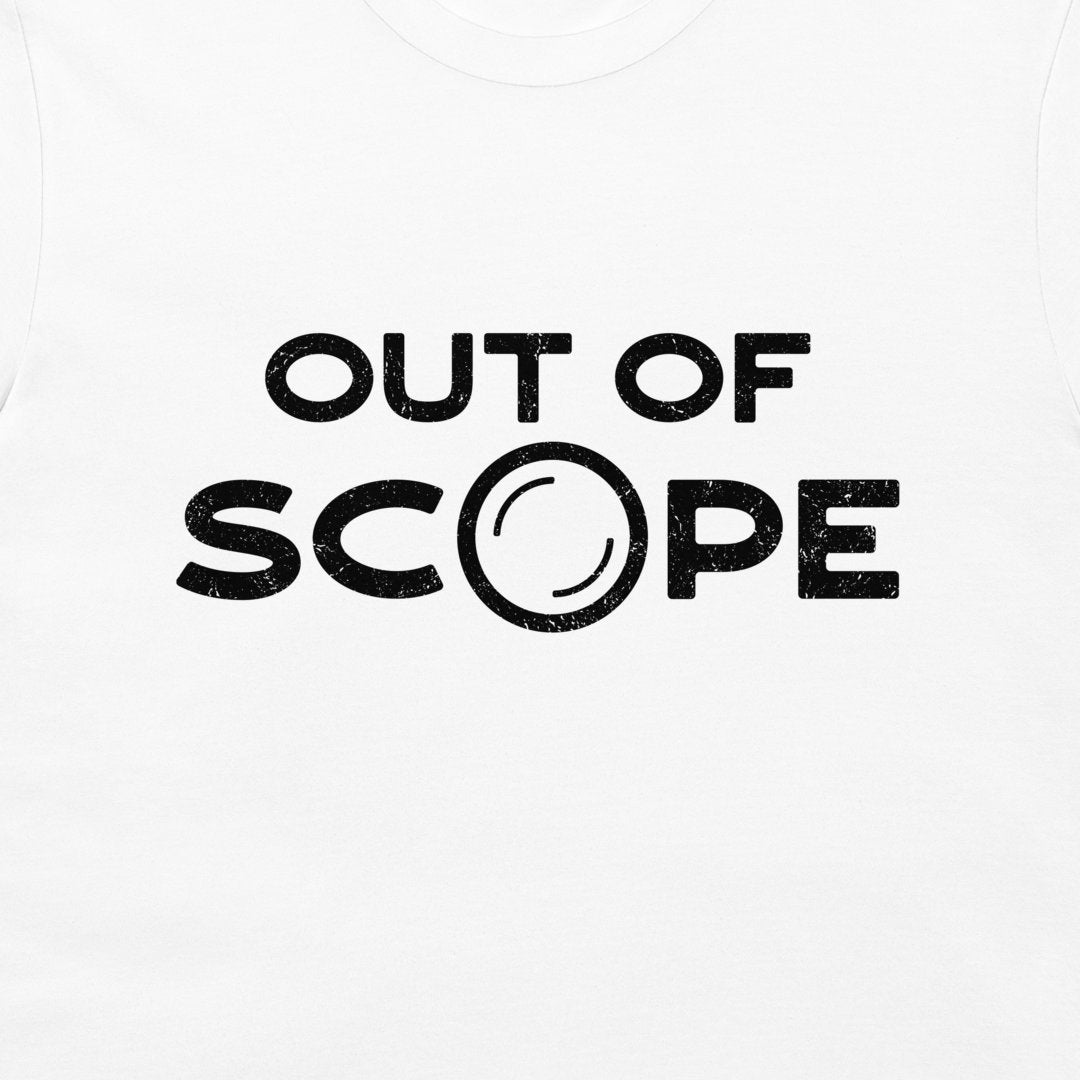 White t-shirt with a black distressed graphic reading 'OUT OF SCOPE' across the chest, featuring a stylized camera lens graphic inside the letter O.