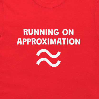 A close-up of a bright red t-shirt featuring the white printed text 'RUNNING ON APPROXIMATION' and a white approximation symbol below it.