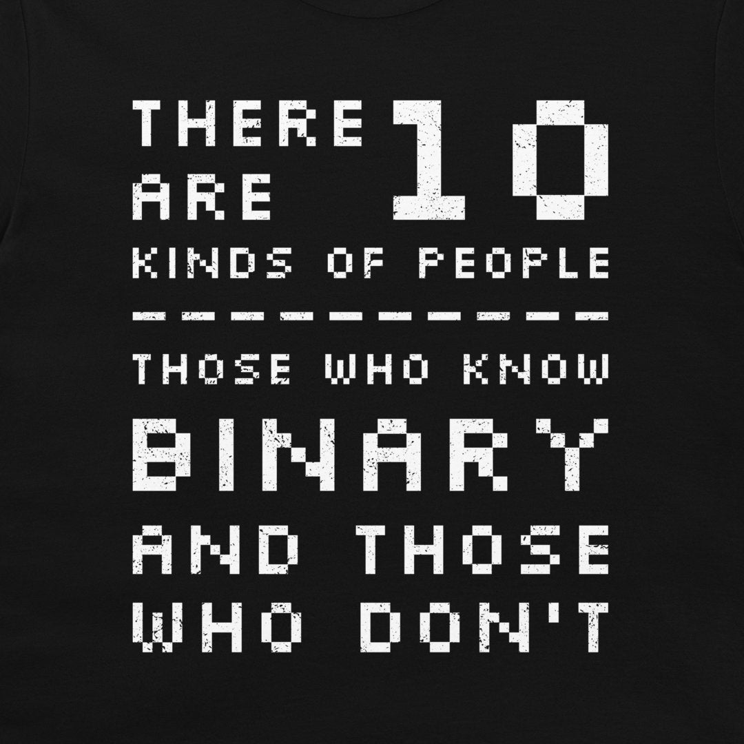 A close-up of a black t-shirt, featuring a white pixelated graphic that reads 'THERE ARE 10 KINDS OF PEOPLE THOSE WHO KNOW BINARY AND THOSE WHO DON'T'.