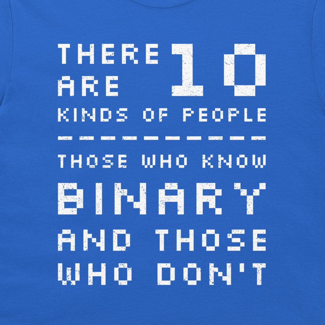 A close-up of a blue t-shirt featuring a white pixelated graphic that reads 'THERE ARE 10 KINDS OF PEOPLE THOSE WHO KNOW BINARY AND THOSE WHO DON'T'.