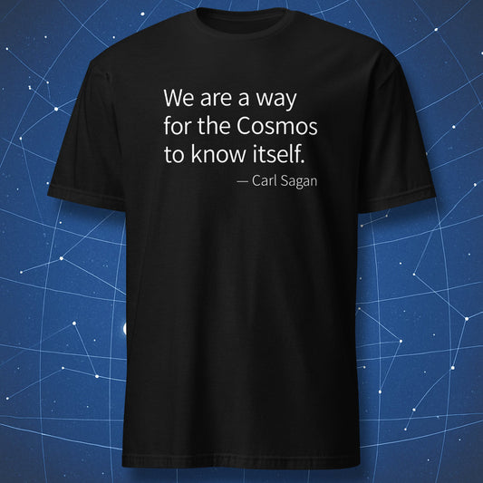 Black t-shirt with Carl Sagan quote “We are a way for the cosmos to know itself” in minimalist white typography