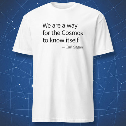 White t-shirt with black typography reading “We are a way for the cosmos to know itself” — Carl Sagan