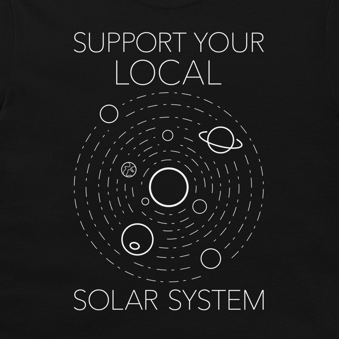 A black t-shirt featuring a white graphic of the solar system with the text 'SUPPORT YOUR LOCAL SOLAR SYSTEM' printed on the front.
