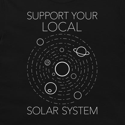A black t-shirt featuring a white graphic of the solar system with the text 'SUPPORT YOUR LOCAL SOLAR SYSTEM' printed on the front.