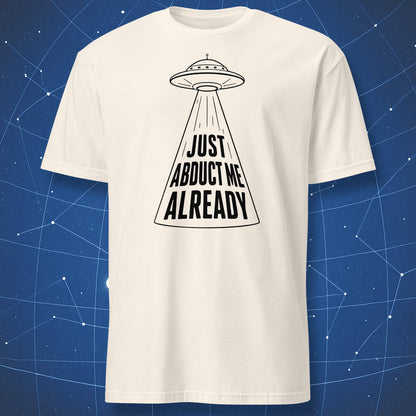 Natural color t-shirt with minimalist alien abduction design and bold text