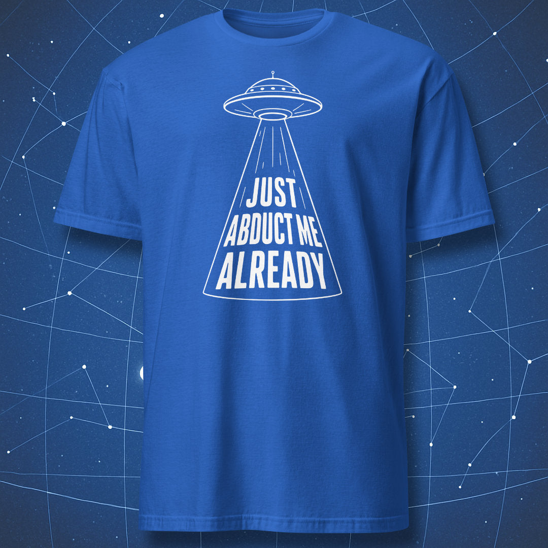 Royal blue t-shirt with clean sci-fi UFO beam and “Just Abduct Me Already” print